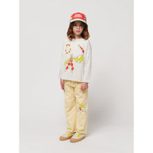 Load image into Gallery viewer, Bobo Choses - Grey long sleeve t-shirt with circus parade master print in yellow and red
