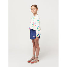 Load image into Gallery viewer, Bobo Choses - cropped white sweatshirt with all over smiley face print in pink and green

