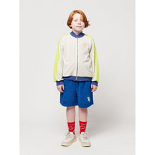 Load image into Gallery viewer, Bobo Choses - grey terry zip up sweatshirt with yellow panels down the arm and navy blue collar and cuffs
