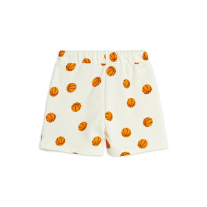 Mini Rodini - cream shorts with all over orange basketball print