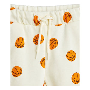 Mini Rodini - cream shorts with all over orange basketball print