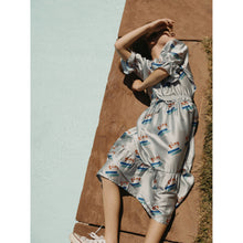 Load image into Gallery viewer, Tinycottons - jade green shiny skirt with 'Tiny' print in red, blue and green
