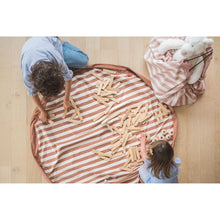 Load image into Gallery viewer, Play and Go toy 2 in 1 toy storage bag and playmat in cactus print or stripe design.