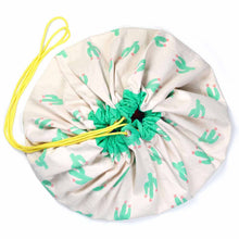 Load image into Gallery viewer, Play and Go toy 2 in 1 toy storage bag and playmat in cactus print or stripe design.