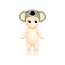 Load image into Gallery viewer, Sonny Angel - Animal Series 1 | Sonny Angels are sweet little angels who each wear different headgear. Animal Series 1 of the collectible Sonny Angel figurines. Standing at 10cm high, these cute angel dolls can be placed anywhere in the home and will bring joy to both children and adults alike. This collection contains 12 different animals including Monkey, Cockerel, Elephant, Koala Bear, Panda, Tiger, Dalmatian, Frog, Sloth, Owl, Polar Bear and Rabbit. Plus one mystery figure. Which one will you get? All S