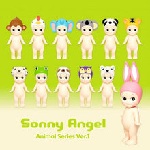 Load image into Gallery viewer, Sonny Angel - Animal Series 1 | Sonny Angels are sweet little angels who each wear different headgear. Animal Series 1 of the collectible Sonny Angel figurines. Standing at 10cm high, these cute angel dolls can be placed anywhere in the home and will bring joy to both children and adults alike. This collection contains 12 different animals including Monkey, Cockerel, Elephant, Koala Bear, Panda, Tiger, Dalmatian, Frog, Sloth, Owl, Polar Bear and Rabbit. Plus one mystery figure. Which one will you get? All S