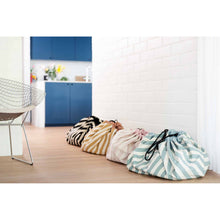 Load image into Gallery viewer, Play and Go toy 2 in 1 toy storage bag and playmat in cactus print or stripe design.
