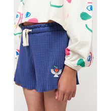 Load image into Gallery viewer, Bobo Choses - cropped white sweatshirt with all over smiley face print in pink and green
