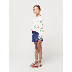 Bobo Choses - cropped white sweatshirt with all over smiley face print in pink and green