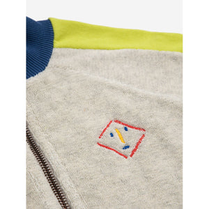 Bobo Choses - grey terry zip up sweatshirt with yellow panels down the arm and navy blue collar and cuffs