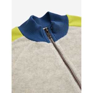 Bobo Choses - grey terry zip up sweatshirt with yellow panels down the arm and navy blue collar and cuffs