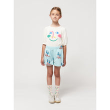 Load image into Gallery viewer, Bobo choses - light blue shorts with all over dancing giants print
