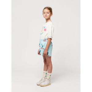 Bobo choses - light blue shorts with all over dancing giants print