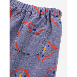 Bobo Choses - dark washed blue woven shorts with all over mask print