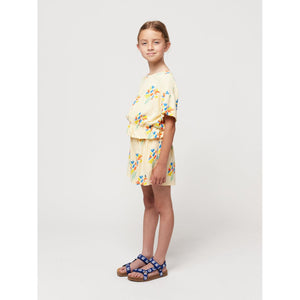 Bobo Choses - pale yellow woven shorts with all over fireworks print