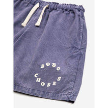 Load image into Gallery viewer, Bobo Choses - dark washed blue woven shorts with circle logo on leg
