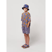 Load image into Gallery viewer, Bobo Choses - dark washed blue woven shorts with circle logo on leg
