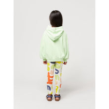 Load image into Gallery viewer, Bobo Choses - off white leggings with all over abstract carnival print in red, green, yellow and blue
