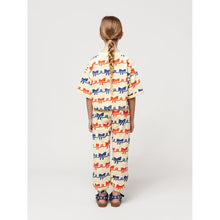 Load image into Gallery viewer, Bobo Choses - beige sweatpants with all over ribbon bow print in red and blue
