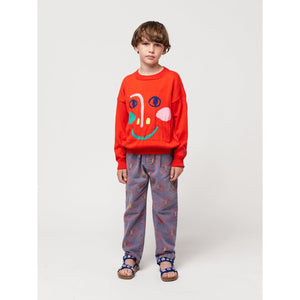 Bobo Choses - dark blue chino trousers with all over mask face print