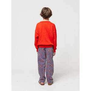 Bobo Choses - dark blue chino trousers with all over mask face print