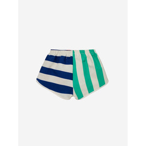 Bobo Choses - multicolour stripe swim shorts in orange, yellow, green and blue.
