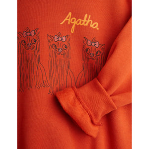 Mini Rodini red sweatshirt with Scottish terrier&nbsp; print on the front and back from the new AW24 collection 'Agatha'