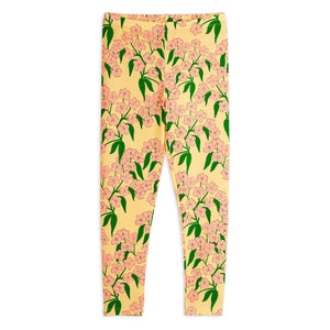 Mini Rodini yellow Leggings with pink floral pattern 
