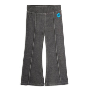 Mini Rodini grey flared pants with a blue flower design 