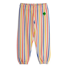Load image into Gallery viewer, Mini Rodini striped pants with a green clover patch 
