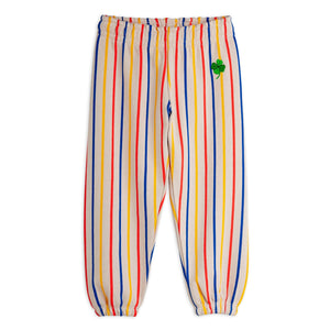 Mini Rodini striped pants with a green clover patch 