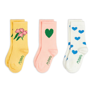 Mini Rodini Three pairs of socks with floral, heart, and blue heart designs 