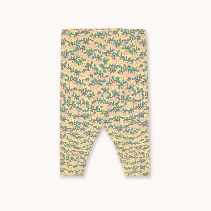 Tinycottons soft yellow baby leggings with mini apple branch print in pink and green