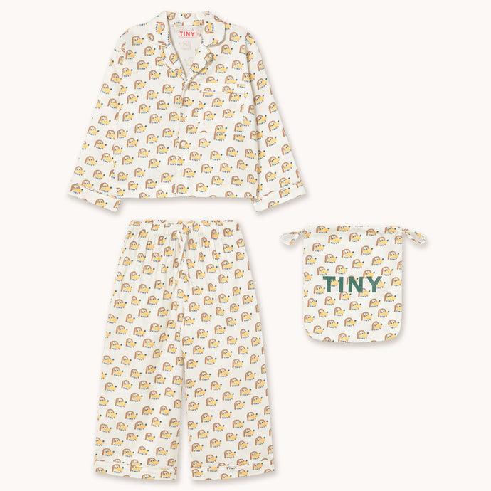 Tinycottons white long sleeve pyjamas with all over cartoon dog print in drawstring bag