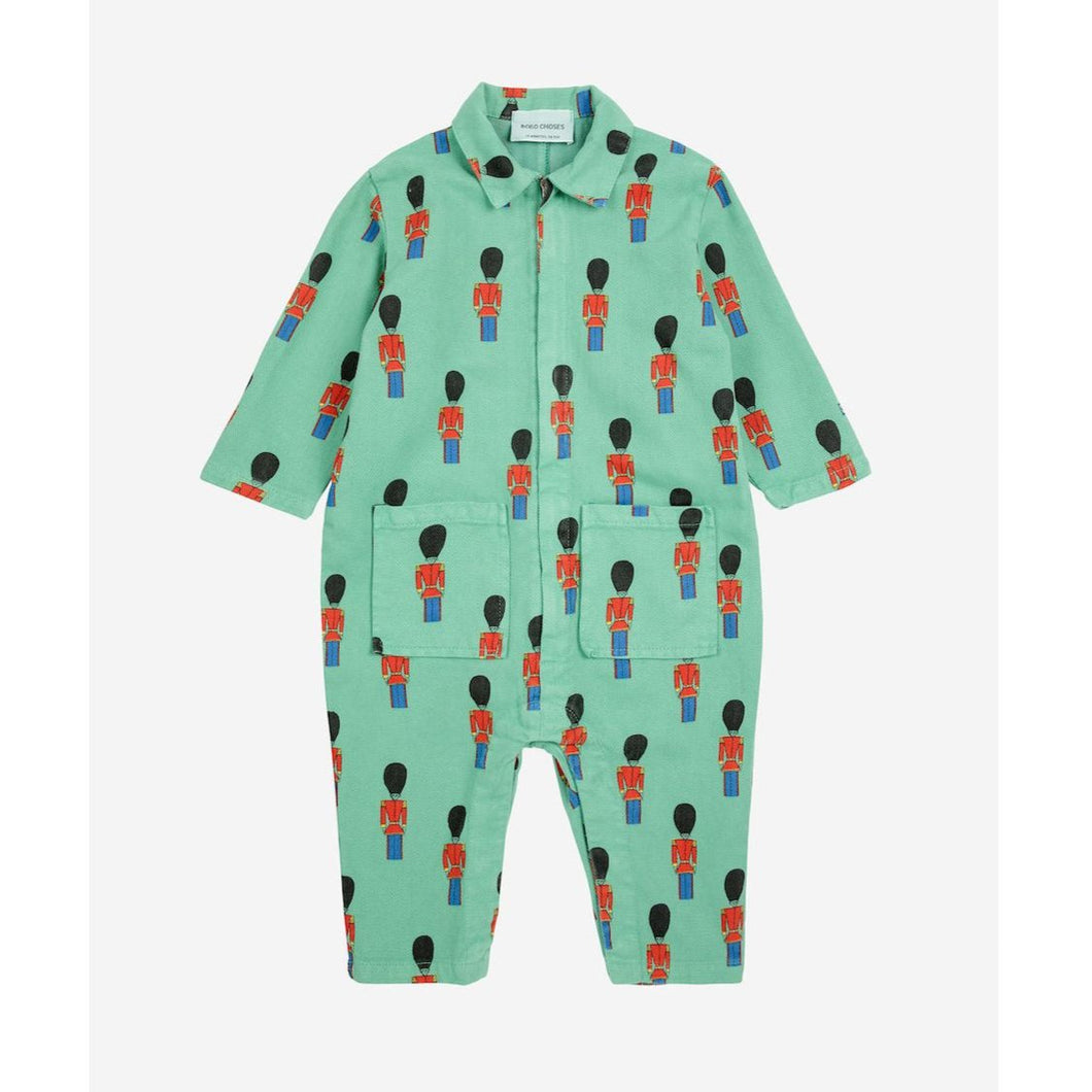 Bobo Choses green baby overall with all over tin soldier print from the new AW24 collection 'Once Upon A Time'