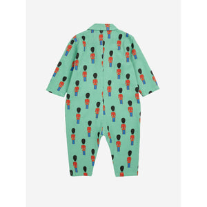 Bobo Choses green baby overall with all over tin soldier print from the new AW24 collection 'Once Upon A Time'