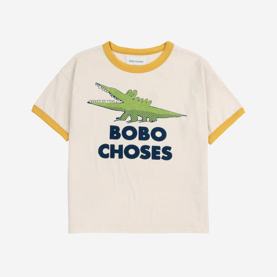 Bobo Choses off white t-shirt with yellow trim and green crocodile print from the new AW24 collection 'Once Upon A Time'