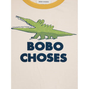 Bobo Choses off white t-shirt with yellow trim and green crocodile print from the new AW24 collection 'Once Upon A Time'