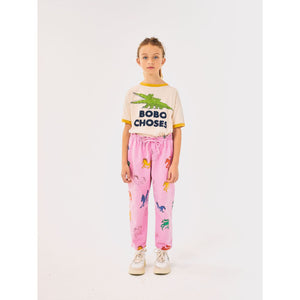 Bobo Choses off white t-shirt with yellow trim and green crocodile print from the new AW24 collection 'Once Upon A Time'