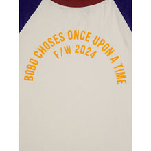 Load image into Gallery viewer, Bobo Choses off white t-shirt with yellow &#39;Once Upon a Time&#39; logo, indigo raglan sleeves and burgundy neck from the new AW24 collection &#39;Once Upon A Time&#39;
