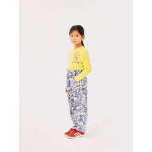 Load image into Gallery viewer, Bobo Choses fine corduroy trousers in white and blue with all over Wonderland print from the new AW24 collection &#39;Once Upon A Time&#39;
