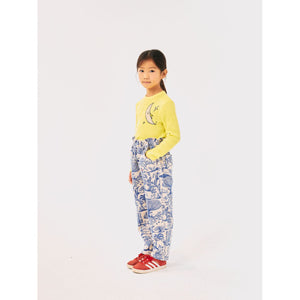 Bobo Choses fine corduroy trousers in white and blue with all over Wonderland print from the new AW24 collection 'Once Upon A Time'