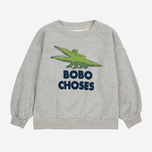 &nbsp;Bobo Choses grey sweatshirt with green crocodile print from the new AW24 collection 'Once Upon A Time'