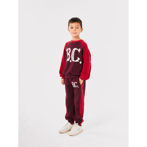 Bobo Choses burgundy and red vintage style sweatpants from the new AW24 collection 'Once Upon A Time'