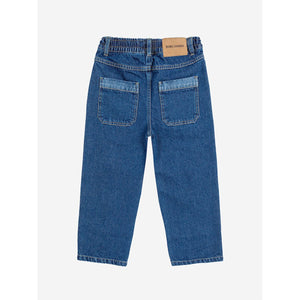 Bobo Choses blue denim trousers with funny face patch&nbsp;from the new AW24 collection 'Once Upon A Time'