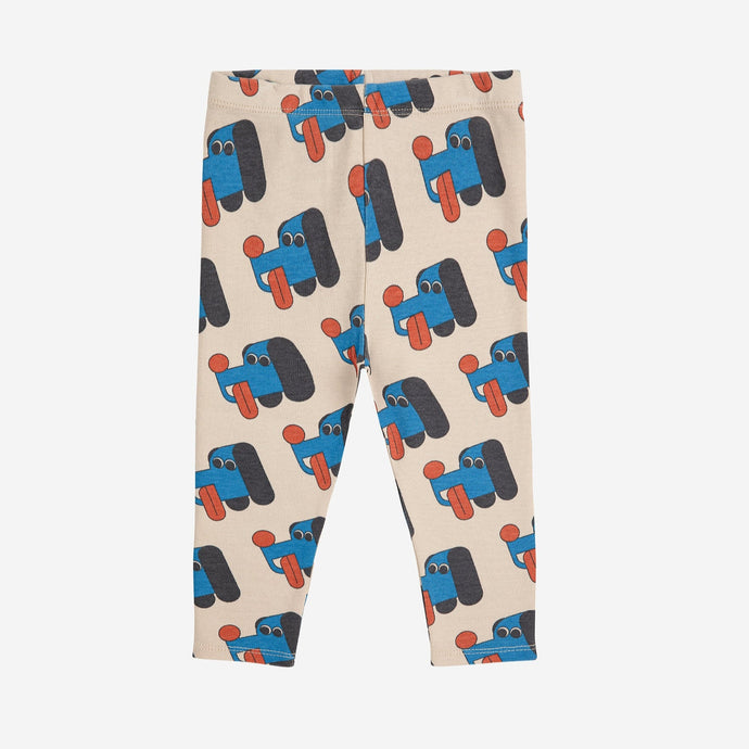 Bobo Choses baby Leggings with blue dog pattern on a beige background