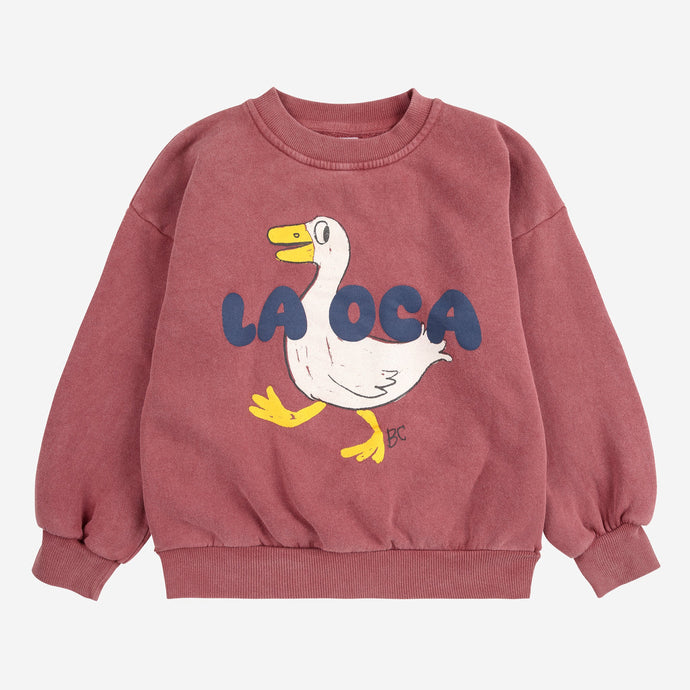 Bobo Choses burgundy sweatshirt with a goose print and 'LA OCA' in blue