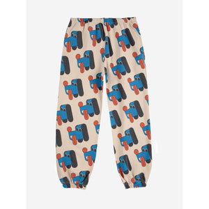 Bobo Choses Beige jogging pants with blue and red dog print