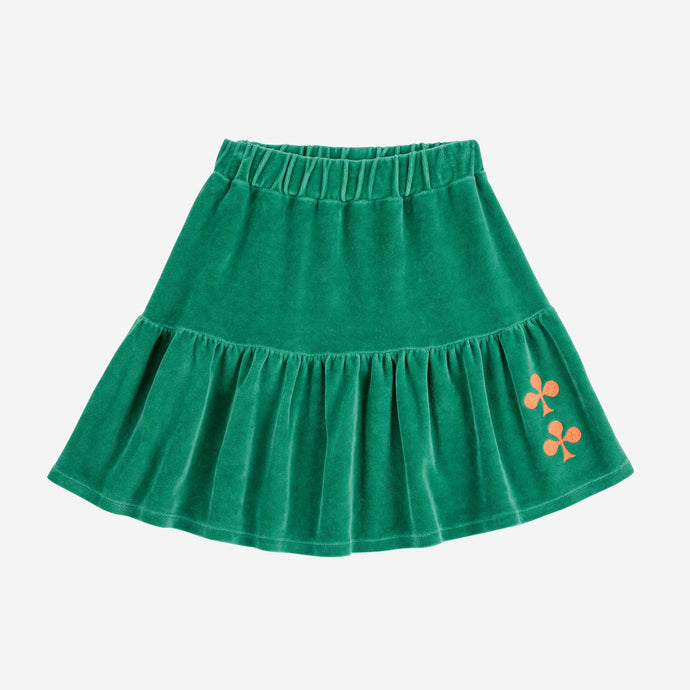 Bobo Choses Green velvet skirt with a small  club design in orange