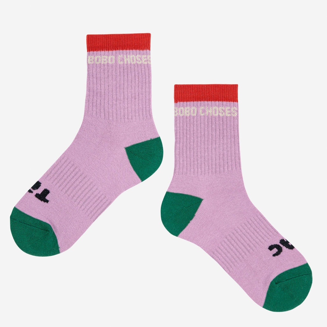 Bobo Choses pink socks with green toes and red band
